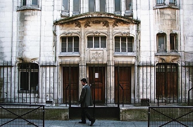 The Art Nouveau front of the synagogue on the Rue Pavée, designed by Hector Guimard, with the Star of David over its doors